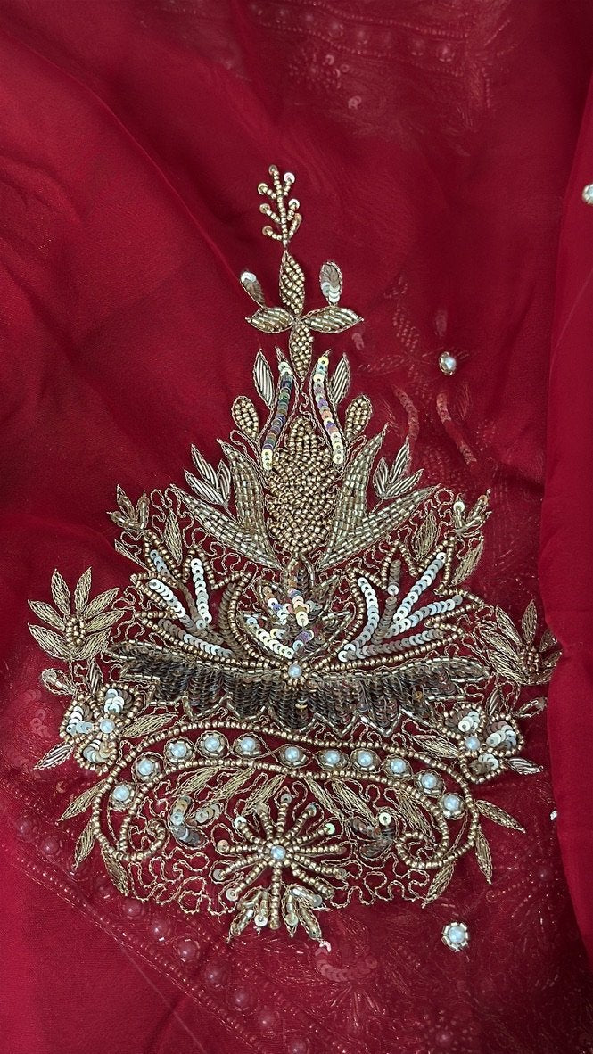 What is zardozi? The raised gold hand-work on a bridal outfit